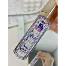Живильна олія для губ з пелюстками квітів Kiko Milano Beauty Essentials